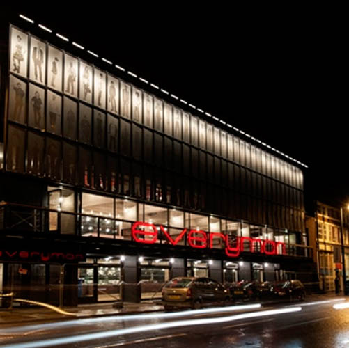 photo of the everyman at night time